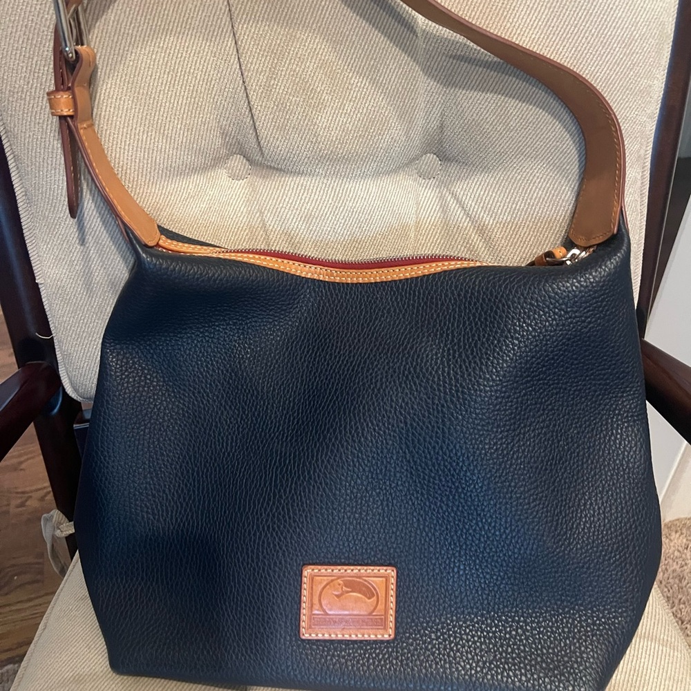 Dooney & Bourke Navy Leather Bag with Brown Logo Patch